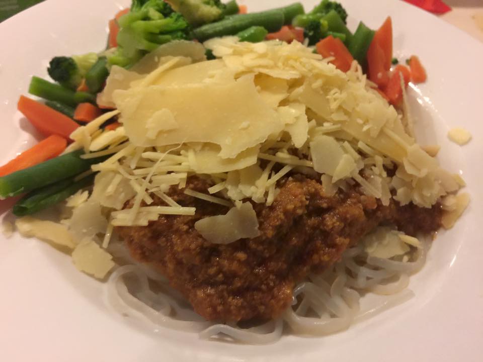 Spagetti Bolognese meal with veggies